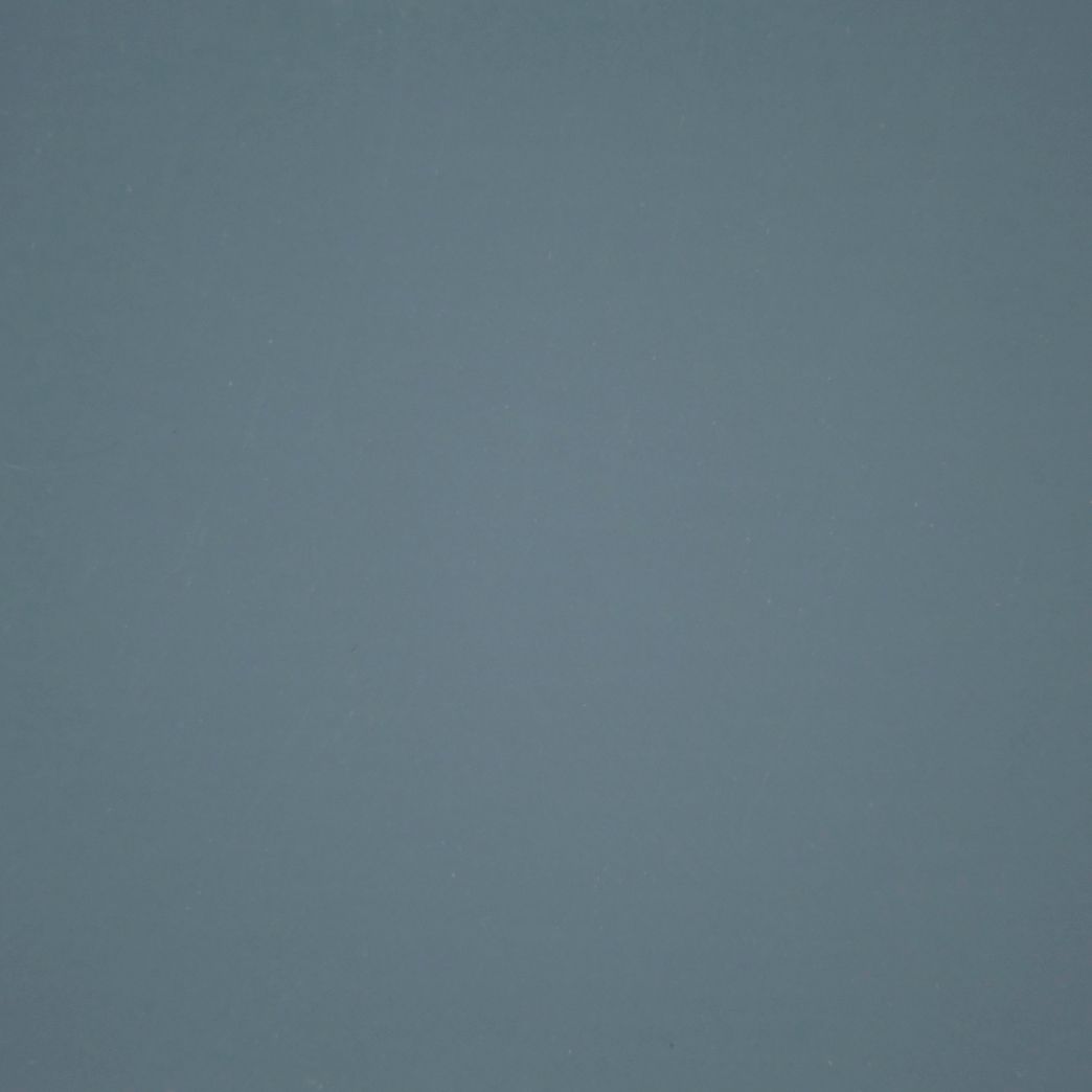 Un gros plan d'un fond gris avec une texture unie.