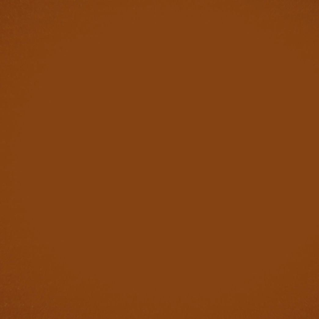 Un gros plan d'un fond marron avec une texture unie.