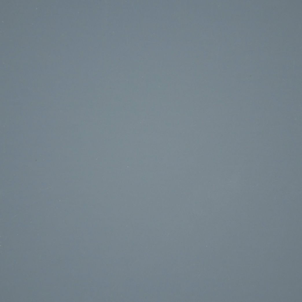 Un gros plan d'un fond gris avec une texture unie.