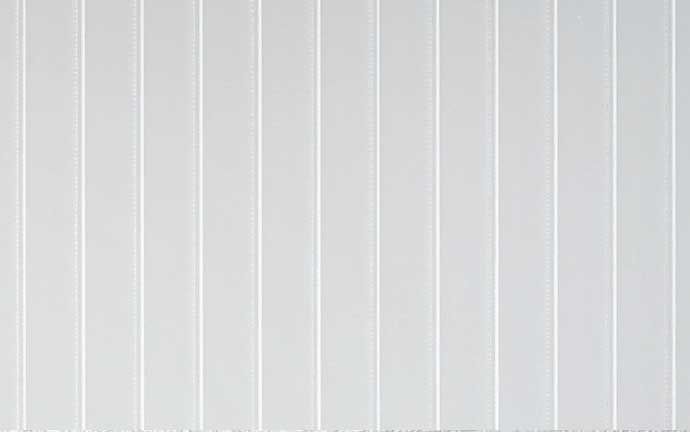 A close up of a white vertical blind on a window.