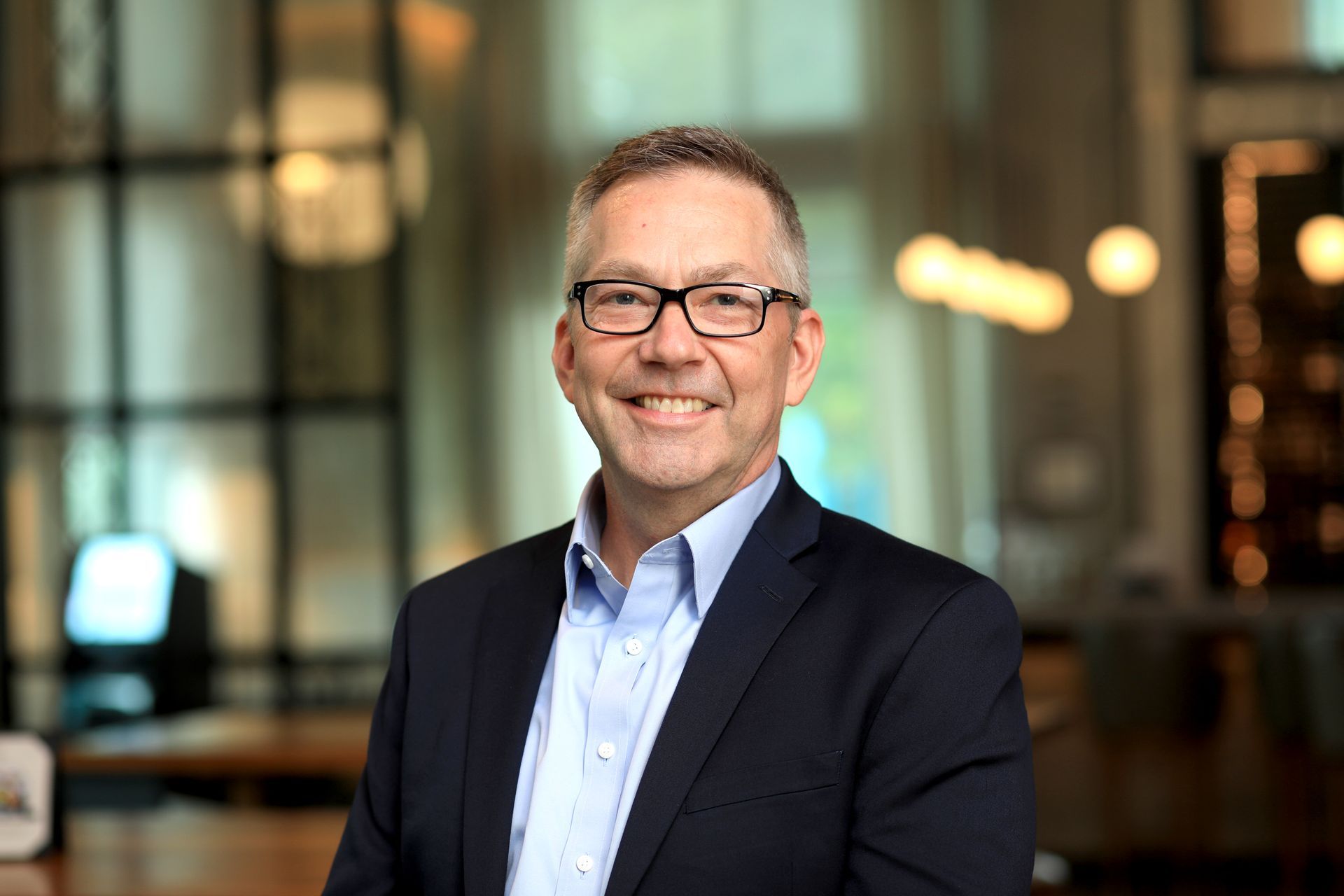 Headshots and portraits captured in a business-relevant environment.
