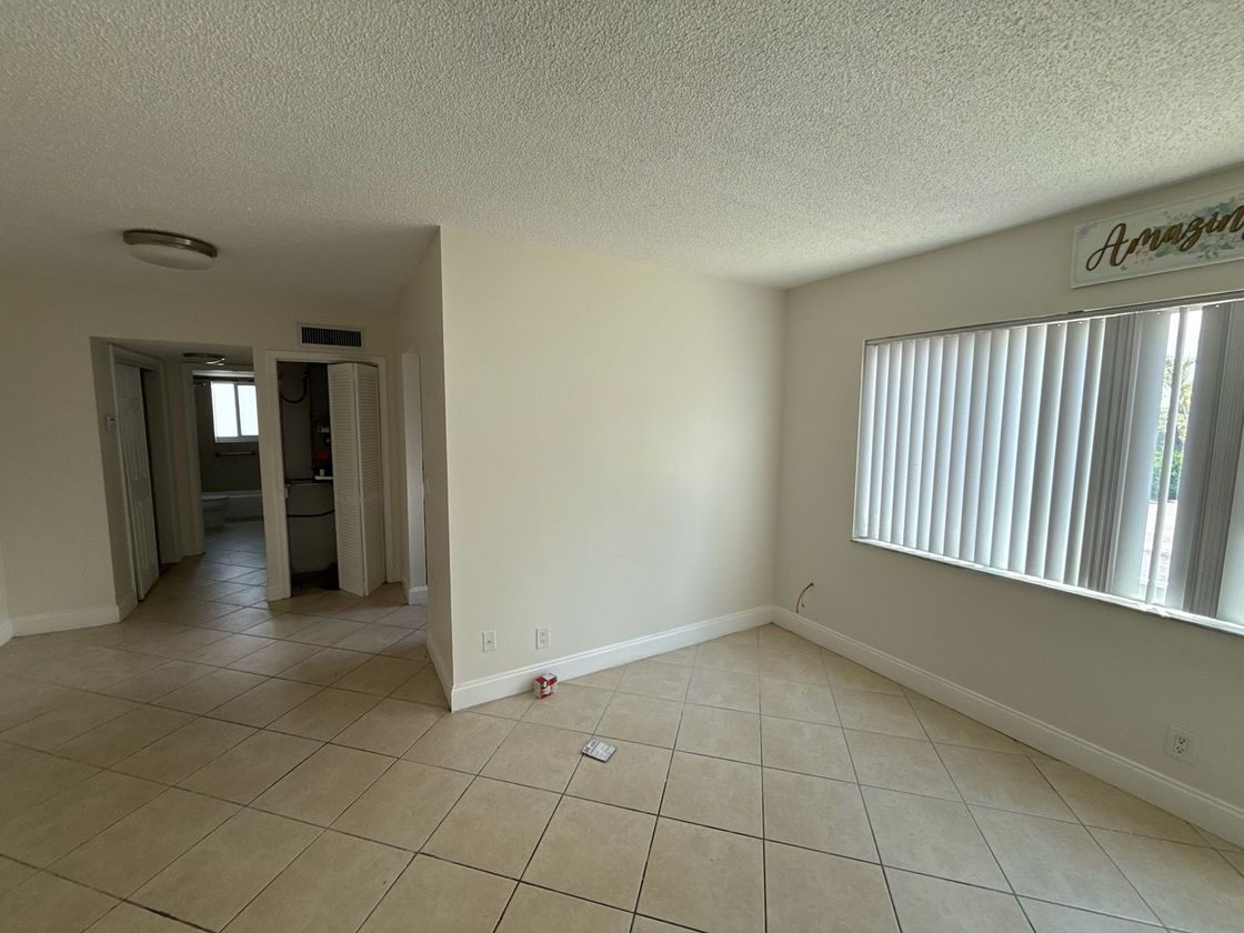 Photo of a living room showing a long window