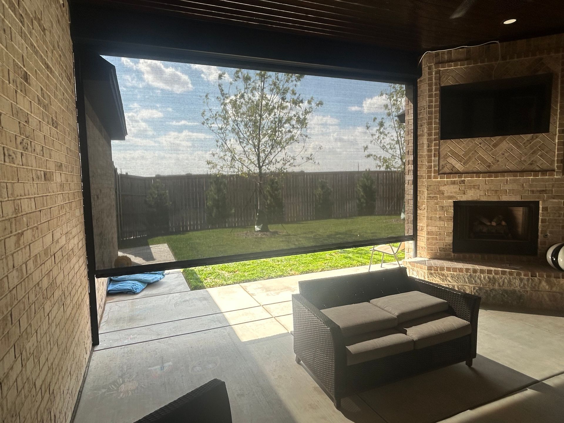 Motorized patio shade installation in Amarillo, TX