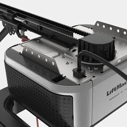 A silver LiftMaster garage door opener motor mounted to a rail assembly against a plain light gray background.