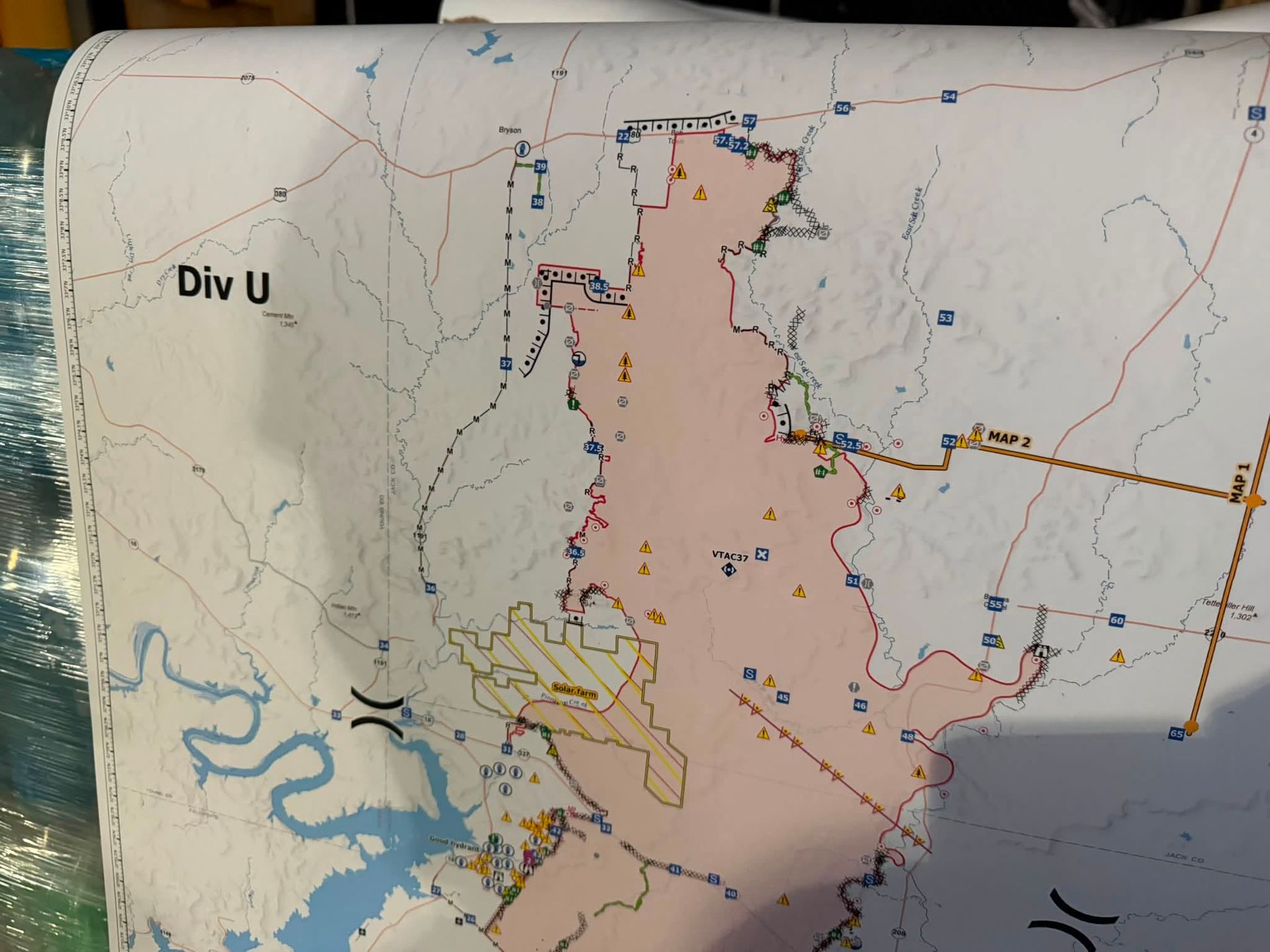 Map labeled “Div U” with a pink highlighted region and blue waterways.