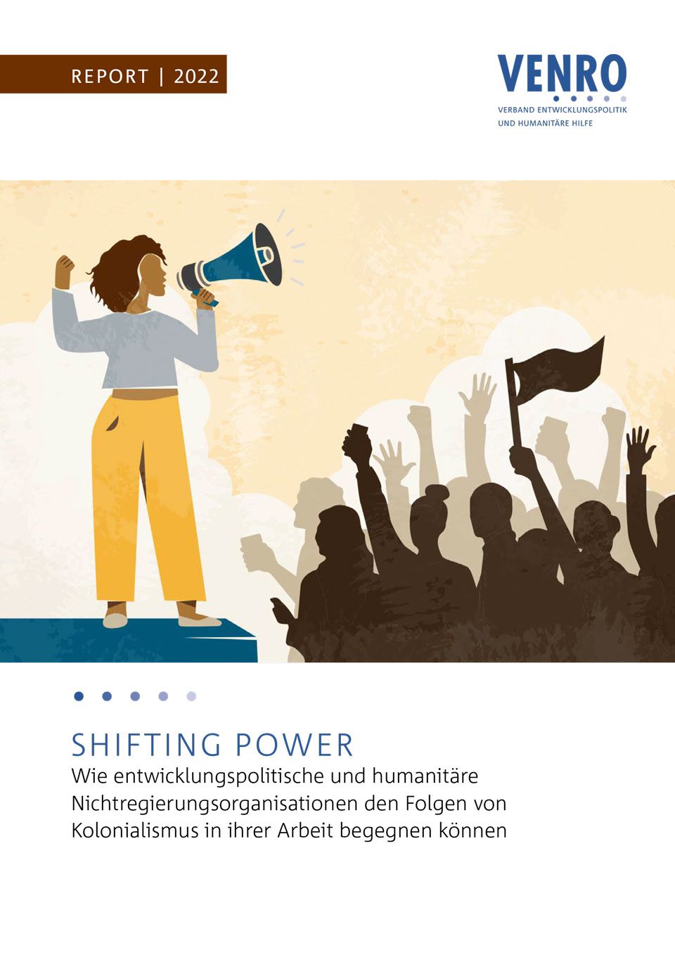 A woman is holding a megaphone in front of a crowd of people.