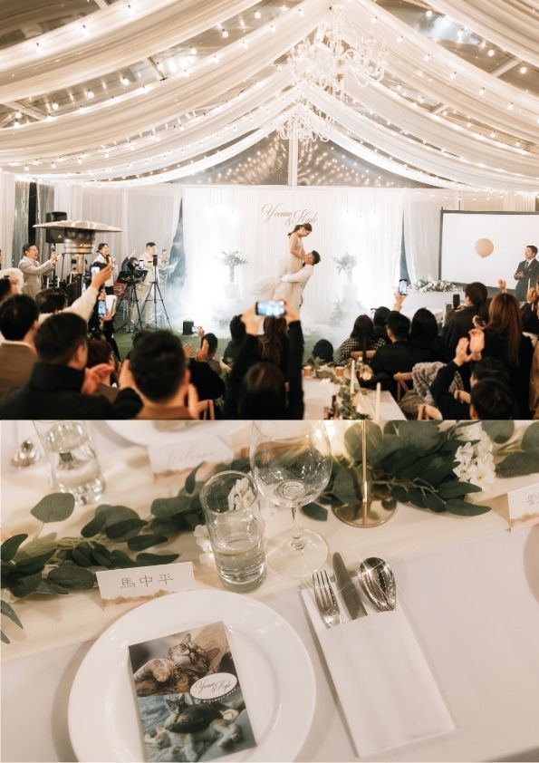 Wedding reception: couple dancing on stage, guests watching. Tables set with white linens, greenery, and place settings.
