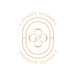 Logo for Canapés Wedding: gold oval with a flower-like design inside, text around the border.