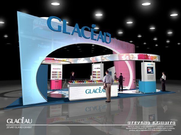 Glaceau trade show booth, blue and pink, with people interacting and product displays.