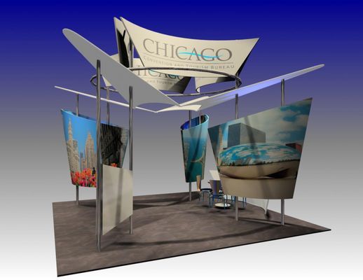 Chicago tourism trade show booth with curved panels displaying photos.