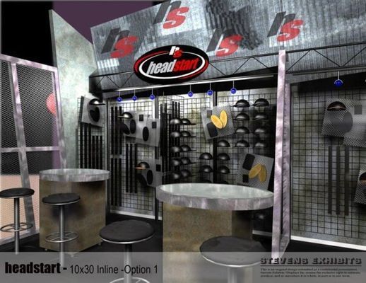 A Head Start booth at an event, with industrial decor and products displayed.