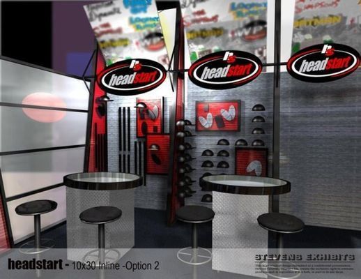 Trade show booth with Headstart logo, tables, and stool seating. Grey and red color scheme.
