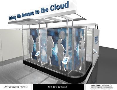 A trade show booth with mannequin figures, digital displays, and a 