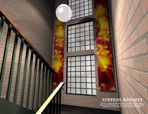 Stairwell with brick walls, large windows, and a decorative banner. A large sphere is suspended from the ceiling.