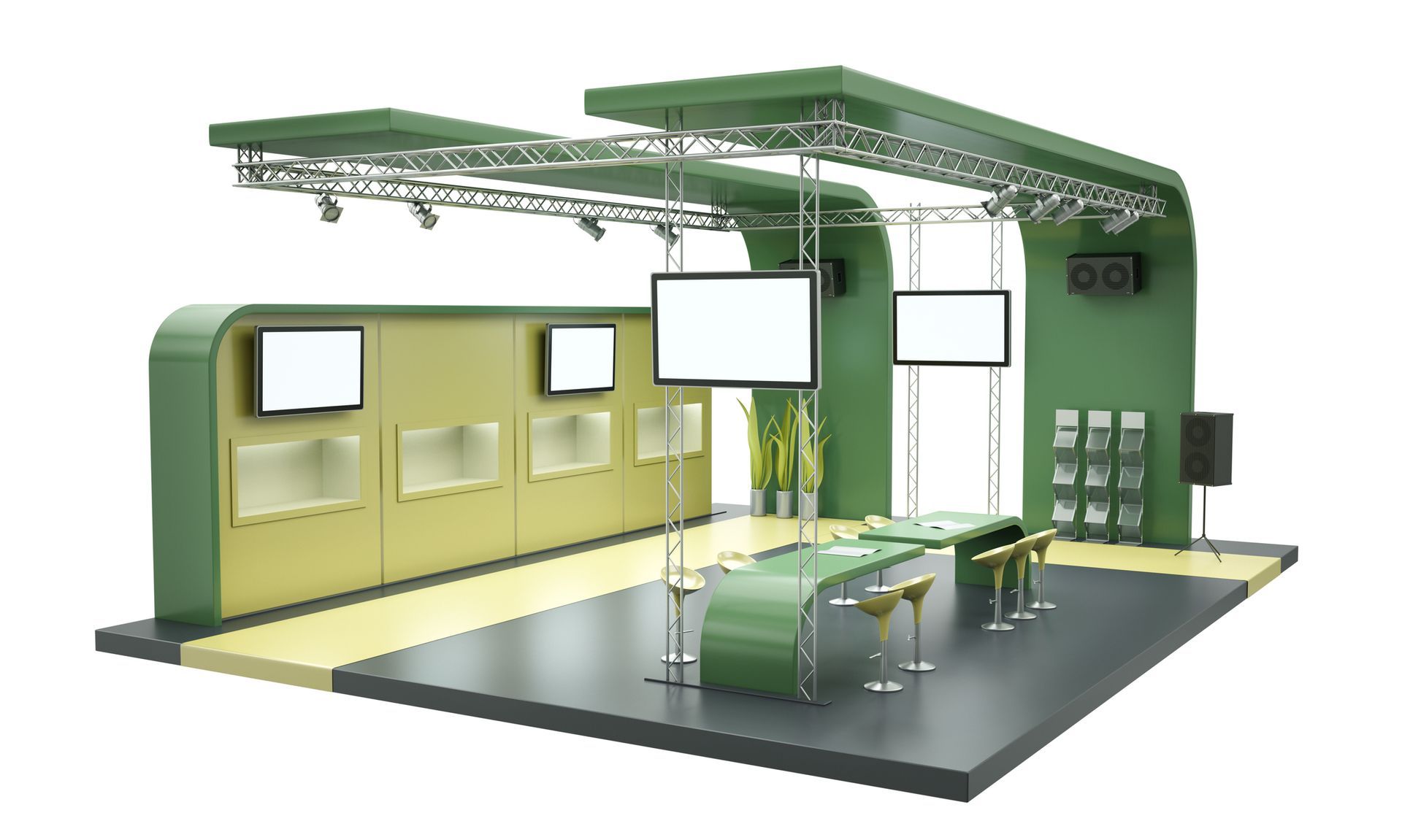 Green and beige trade show booth with monitors, displays, and tables.
