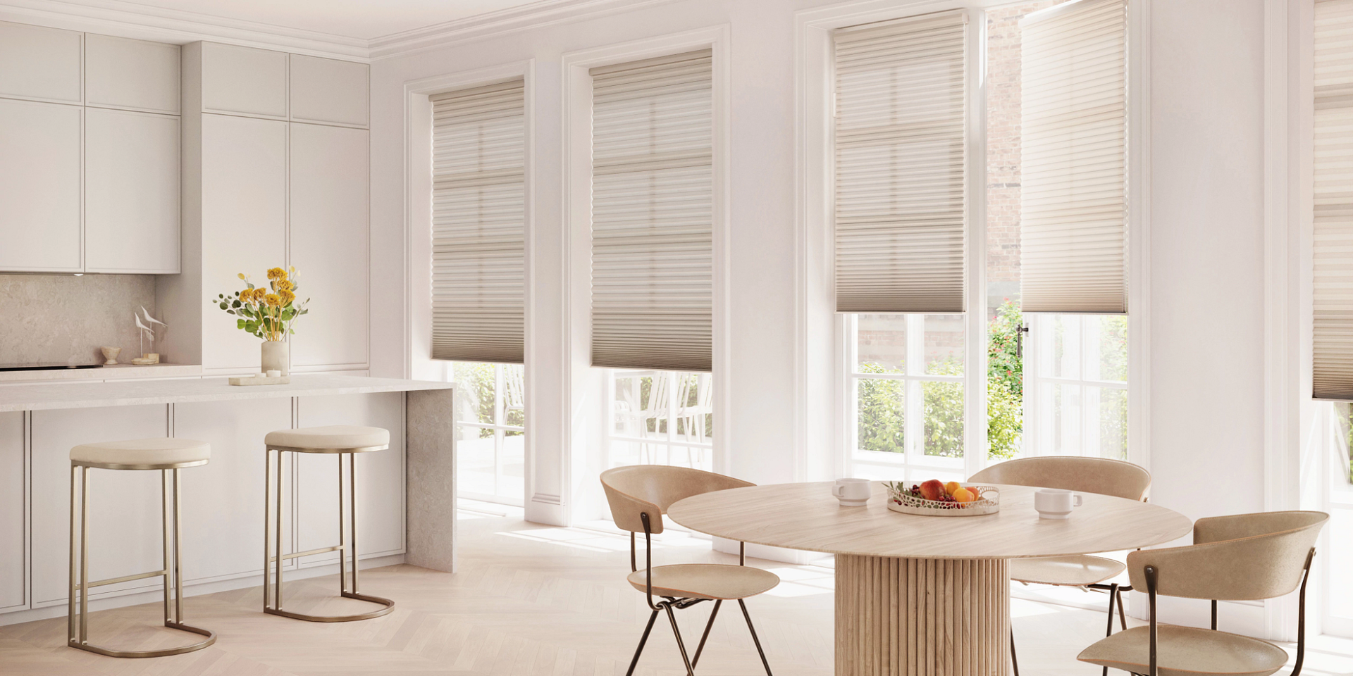 Hunter Douglas energy-efficient cellular shades on tall windows and French doors in a kitchen