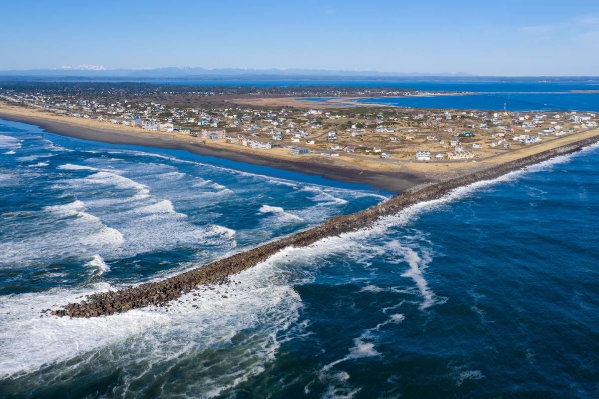 An image showing the land and water near Ocean Shores, Washington, on a beautiful blue day