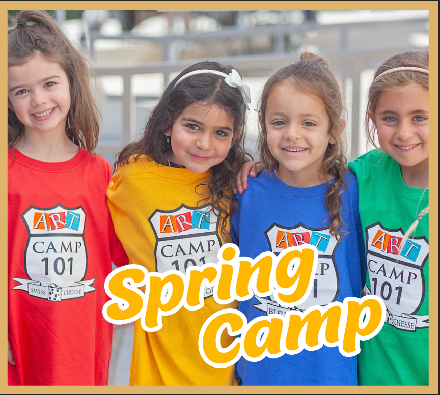 A group of young girls wearing shirts that say spring camp