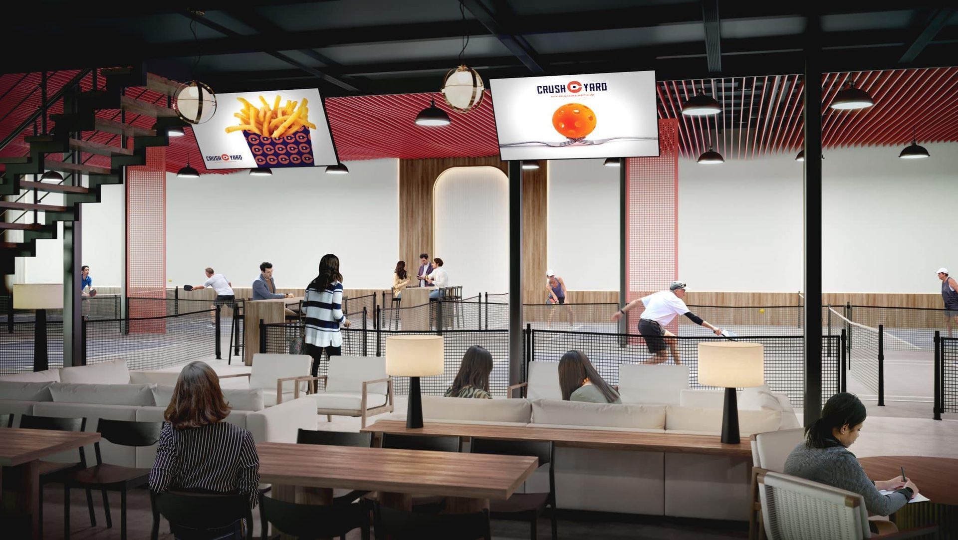 Indoor sports and dining area with people, TVs, tables, and decorative red accents.
