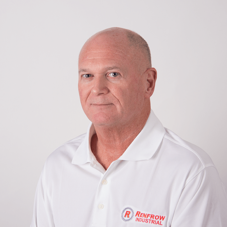 Bald man in white polo shirt, Renfrew Industrial logo, looking directly at the viewer.