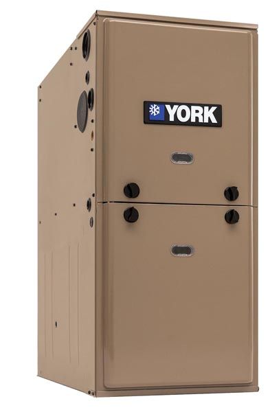 Beige YORK furnace cabinet with front access panels and logo