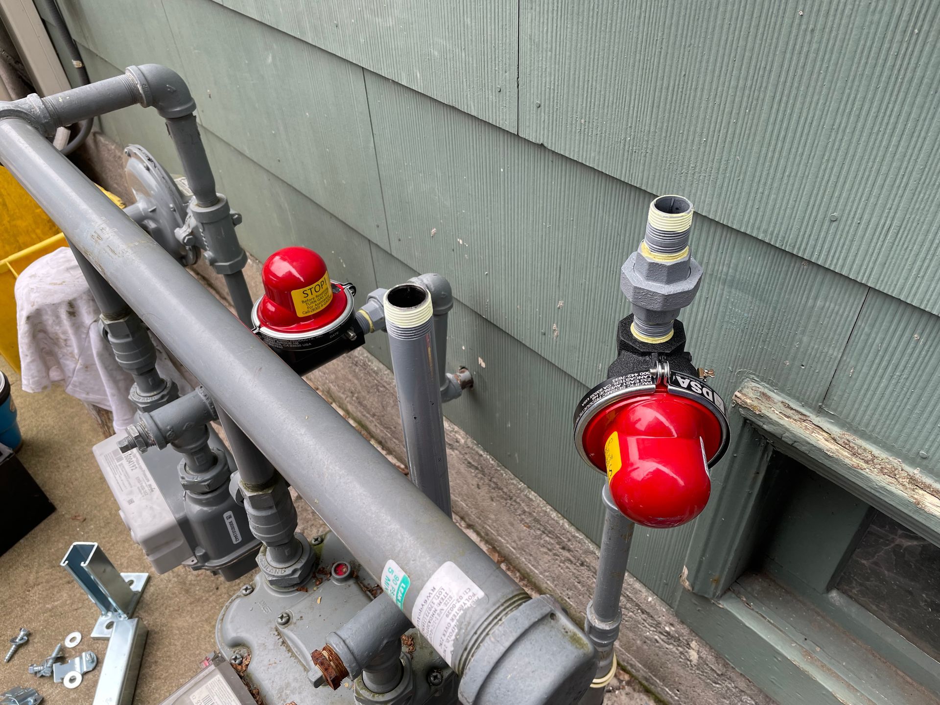 Earthquake gas shutoff valve installed on residential gas line in Portland Oregon