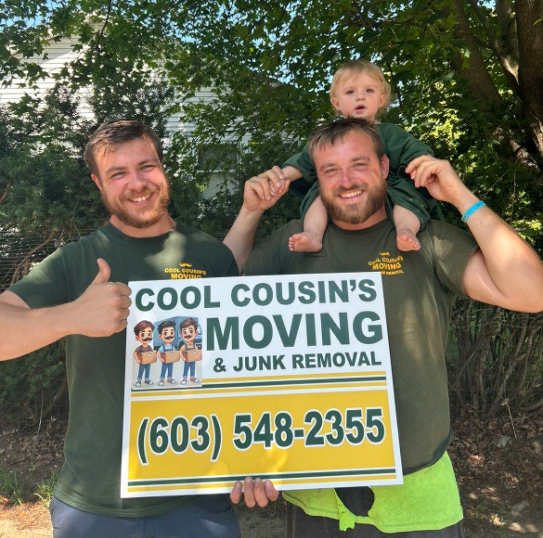 Two smiling men and a child hold a 