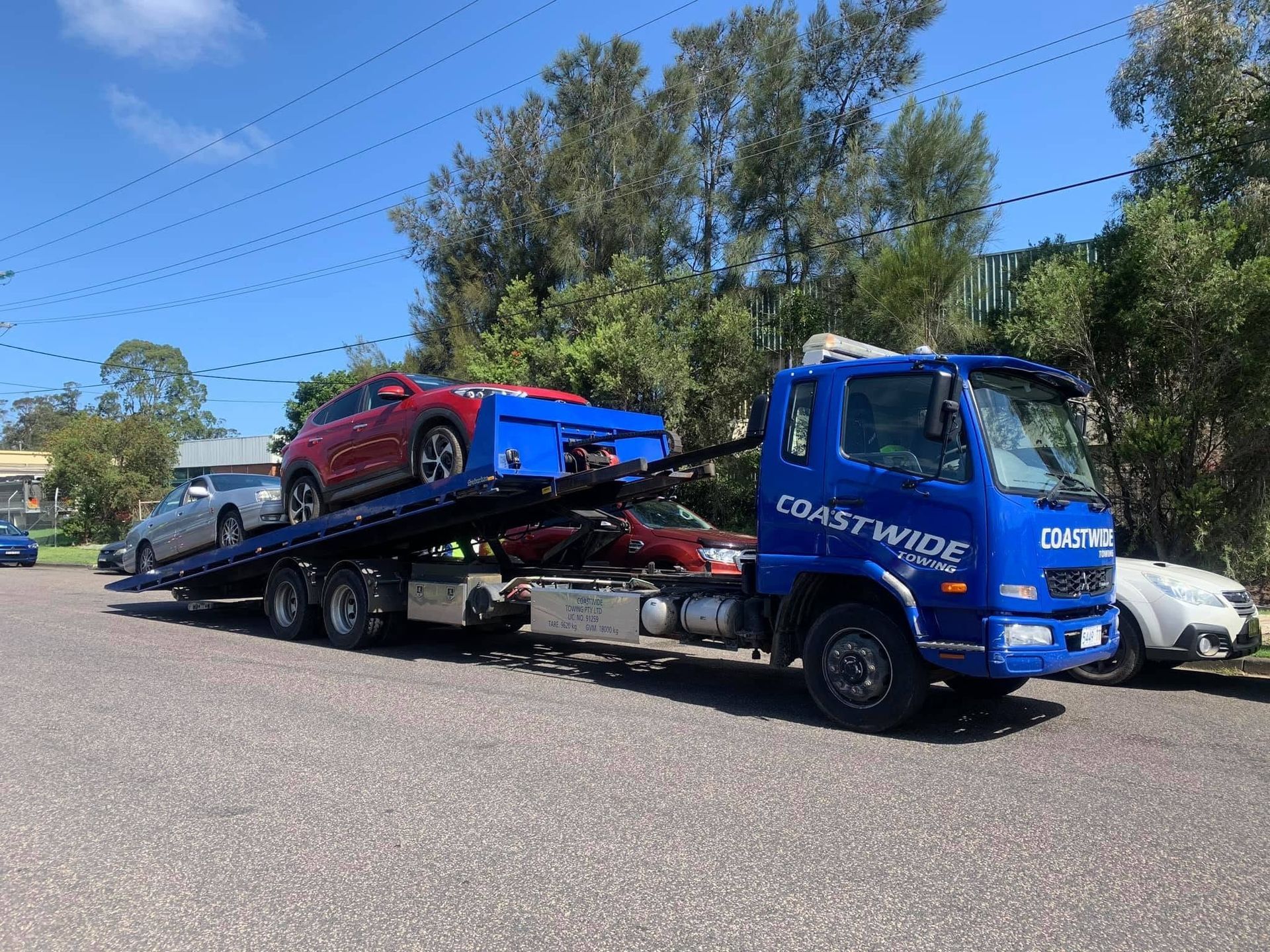 Blue Tow Truck Parked Outside in Newcastle