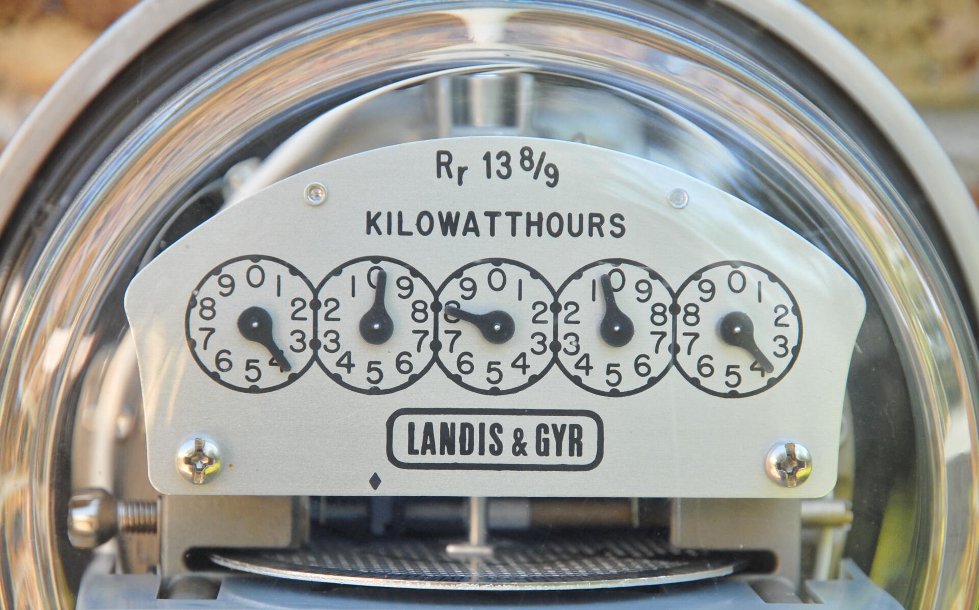 Electricity meter with five dials, reading 59,901 kilowatt-hours.