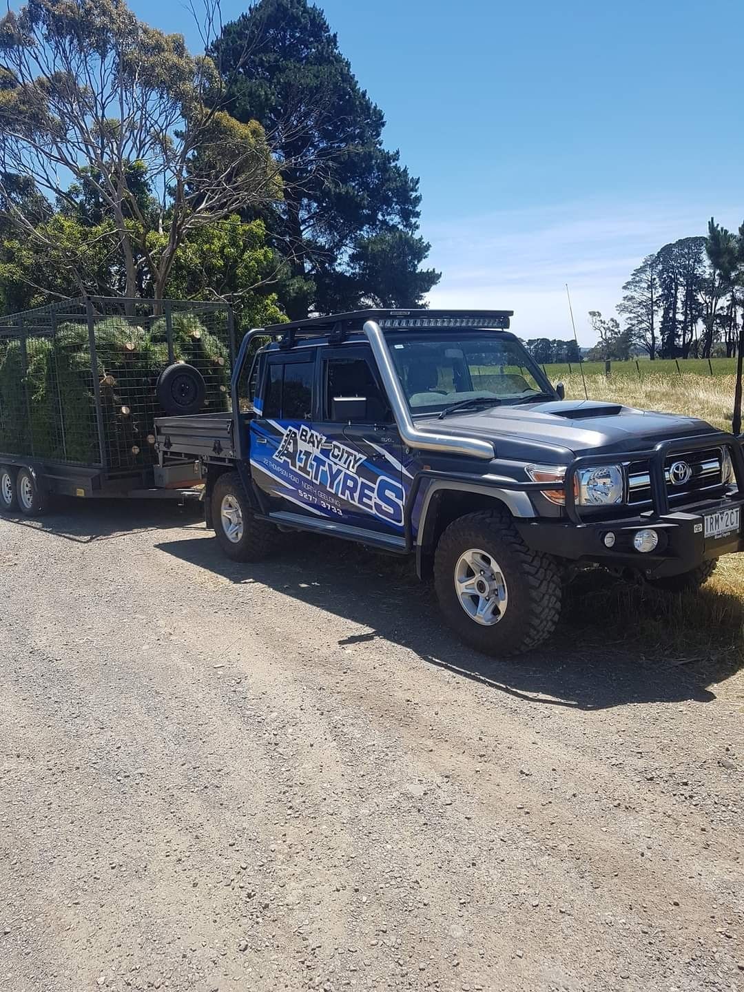 Black Off-Road Pickup Truck on A Gravel Road — Bay City A1 Tyres in North Geelong, VIC