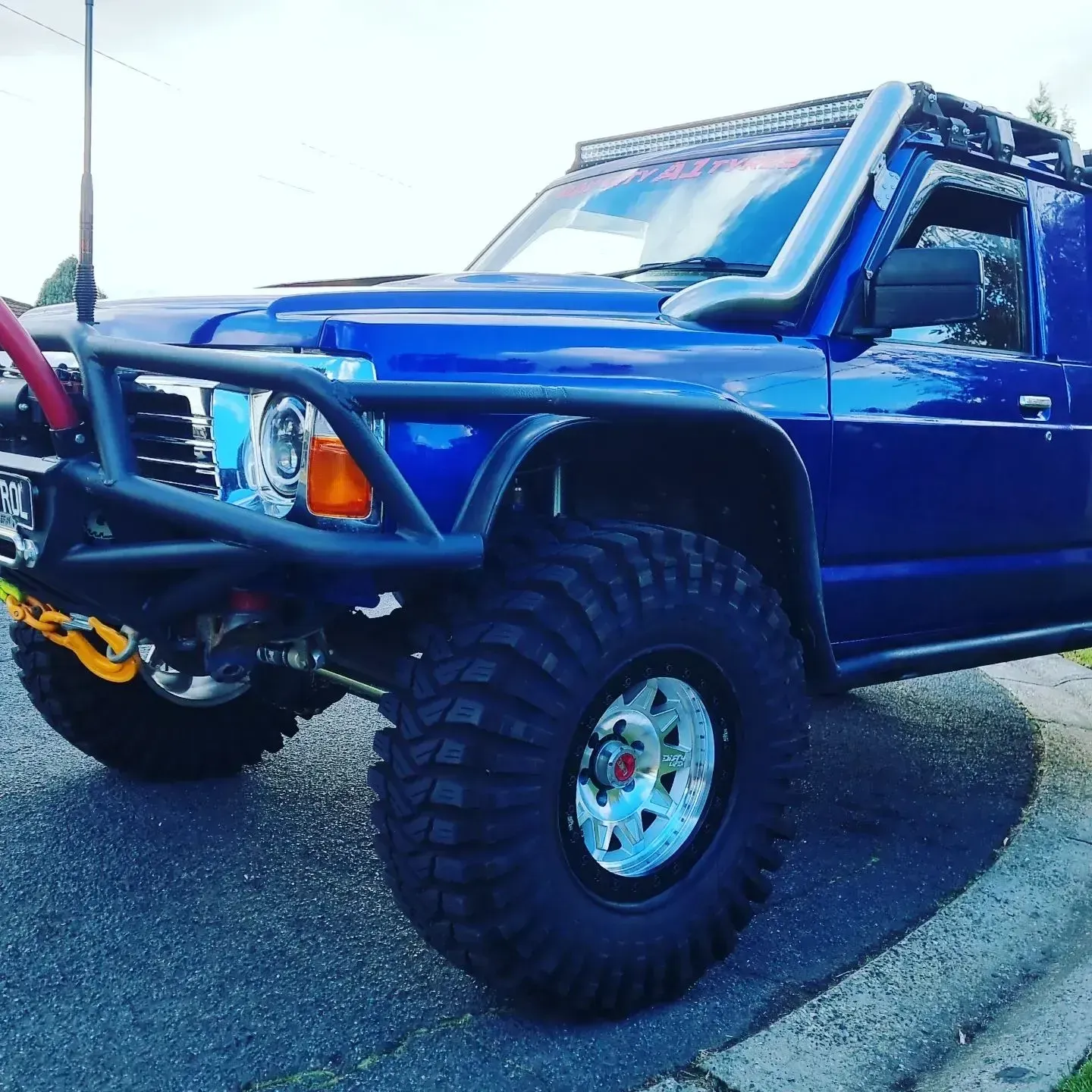 Blue Off-Road Pickup Truck with Large Tires and Front Bumper — Bay City A1 Tyres in North Geelong, VIC