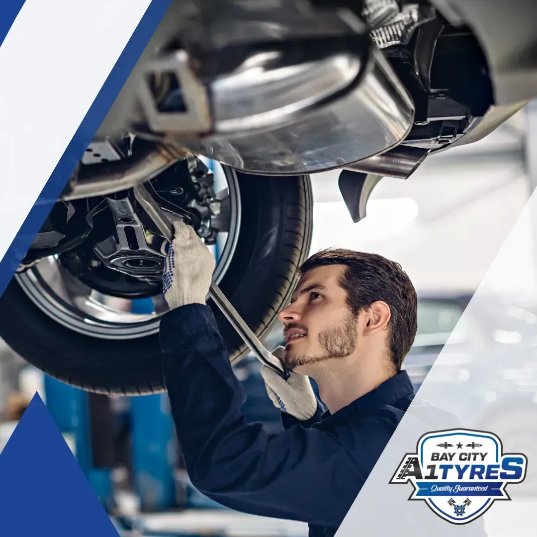 Mechanic Inspecting a Car’s Underside in A Repair Shop — Bay City A1 Tyres in North Geelong, VIC