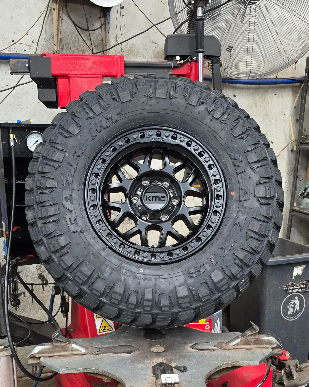 Off-Road Tire Mounted on A Wheel Balancing Machine in A Workshop — Bay City A1 Tyres in North Geelong, VIC