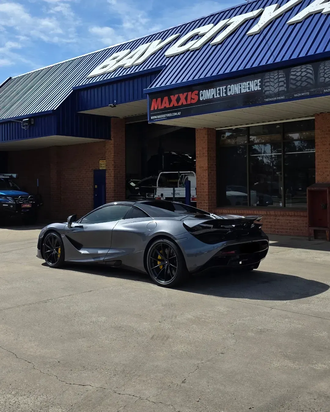 Orange Sports Car with Hood Open in A Showroom — Bay City A1 Tyres in North Geelong, VIC