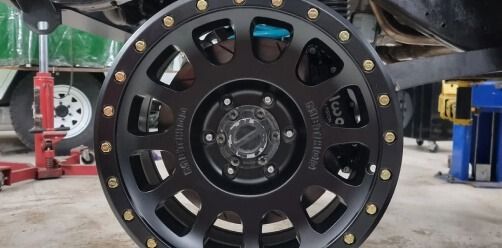 Black Off Road Wheel Rim Mounted On A Vehicle — Bay City A1 Tyres in North Geelong, VIC