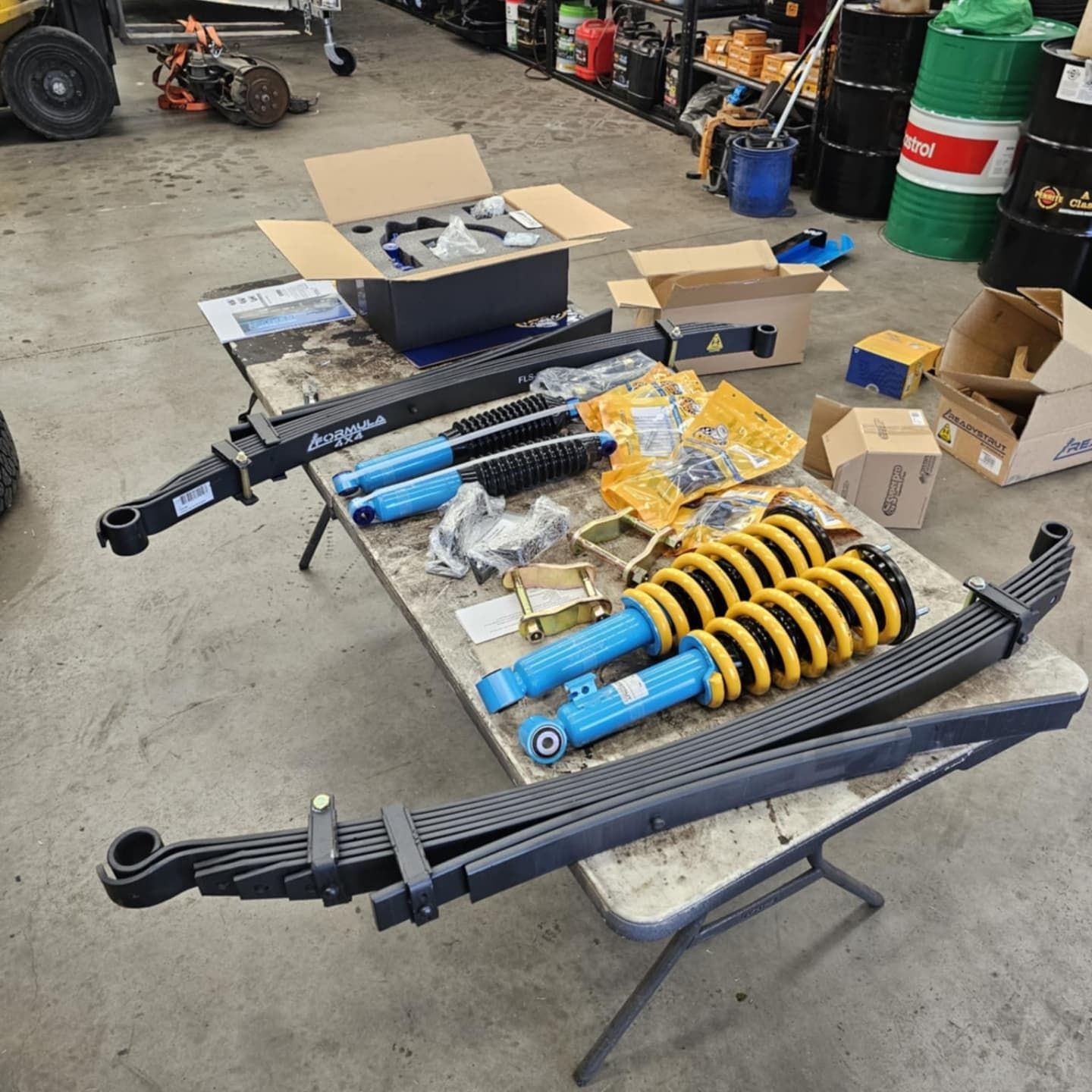 Suspension Parts Laid out On a Workbench — Bay City A1 Tyres in North Geelong, VIC