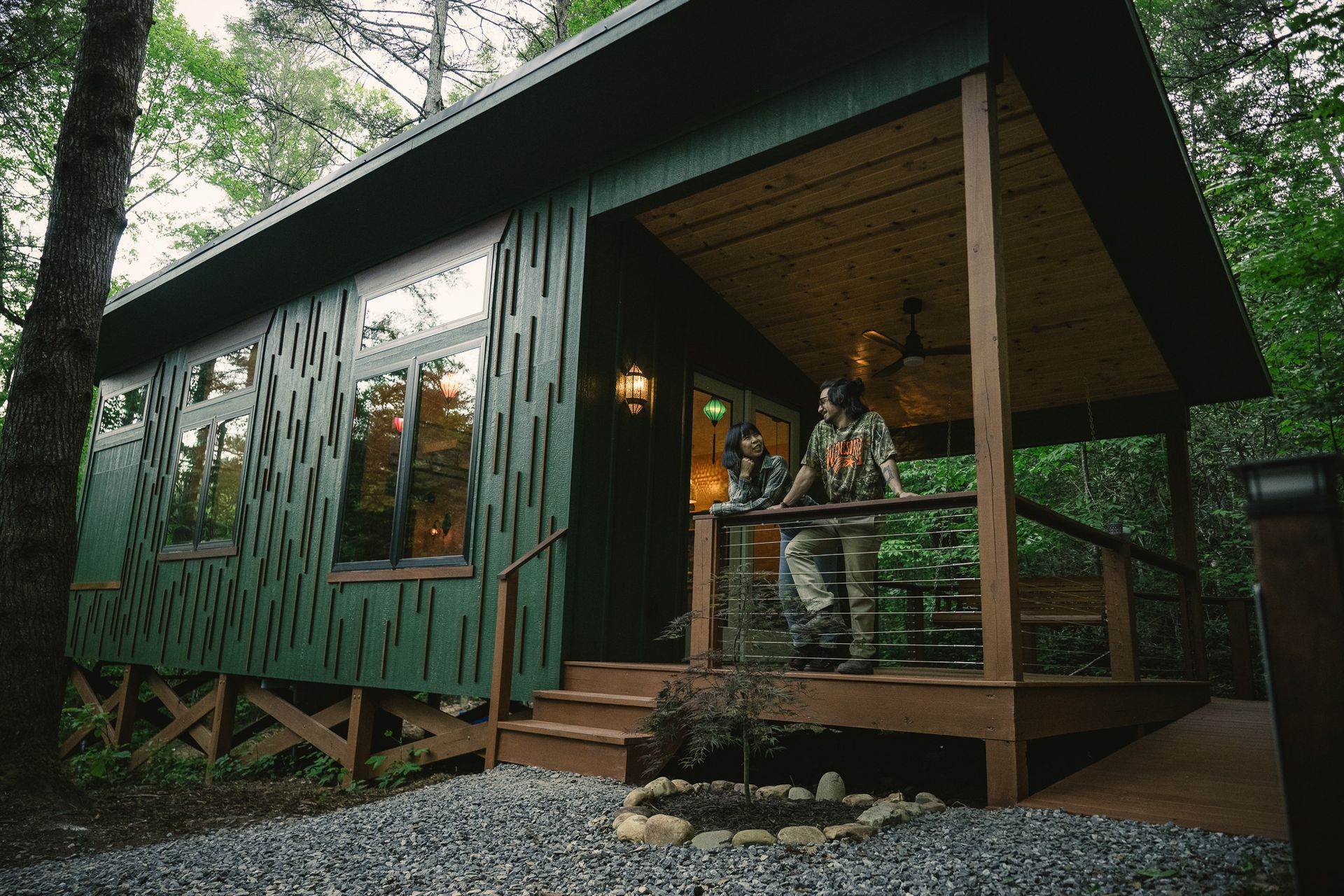 An a-frame cabin in the woods