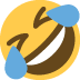 A laughing emoji with tears coming out of its eyes.