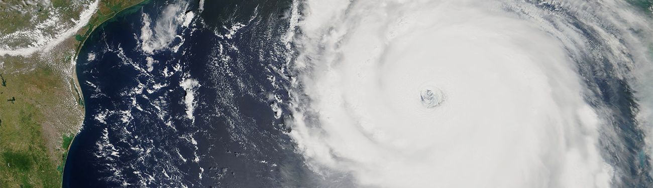 An aerial view of a hurricane in the ocean.