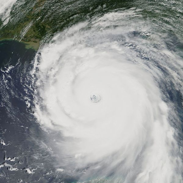An aerial view of a hurricane in the ocean.