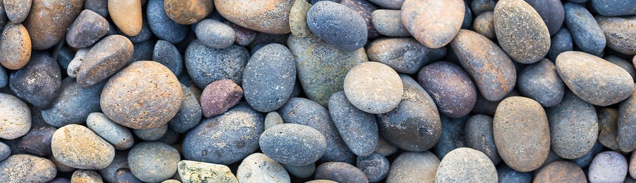 A pile of rocks of different sizes and colors.