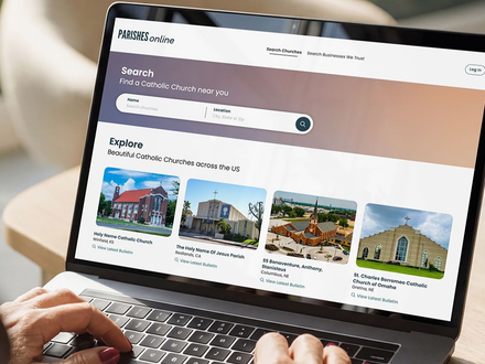 Laptop displaying the front page of ParishesOnline.com