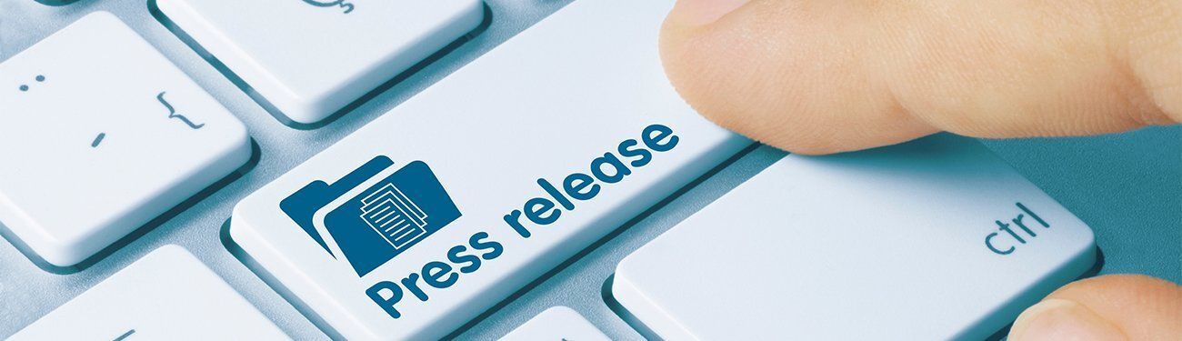 A person is pressing the press release key on a keyboard.