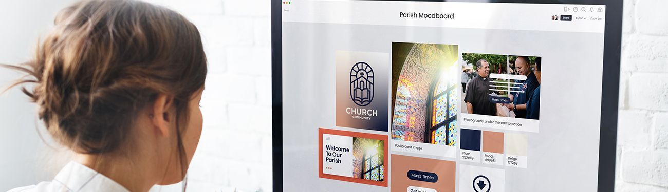 A woman is looking at a computer screen with pictures on it.
