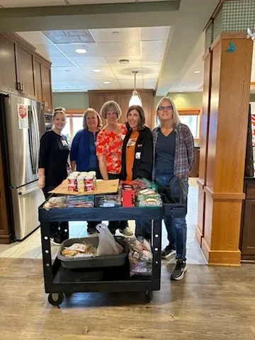 LPi employees volunteering making meals at the Ronald McDonald house