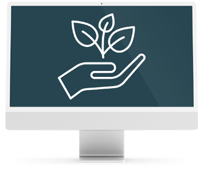 A computer monitor with a hand holding a plant on the screen.