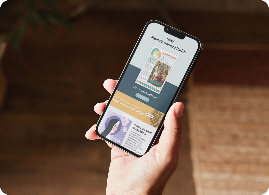 A person is holding a cell phone in their hand showing an email.