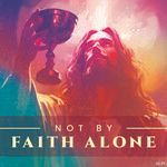 Jesus with a beard is holding a chalice in his hand.