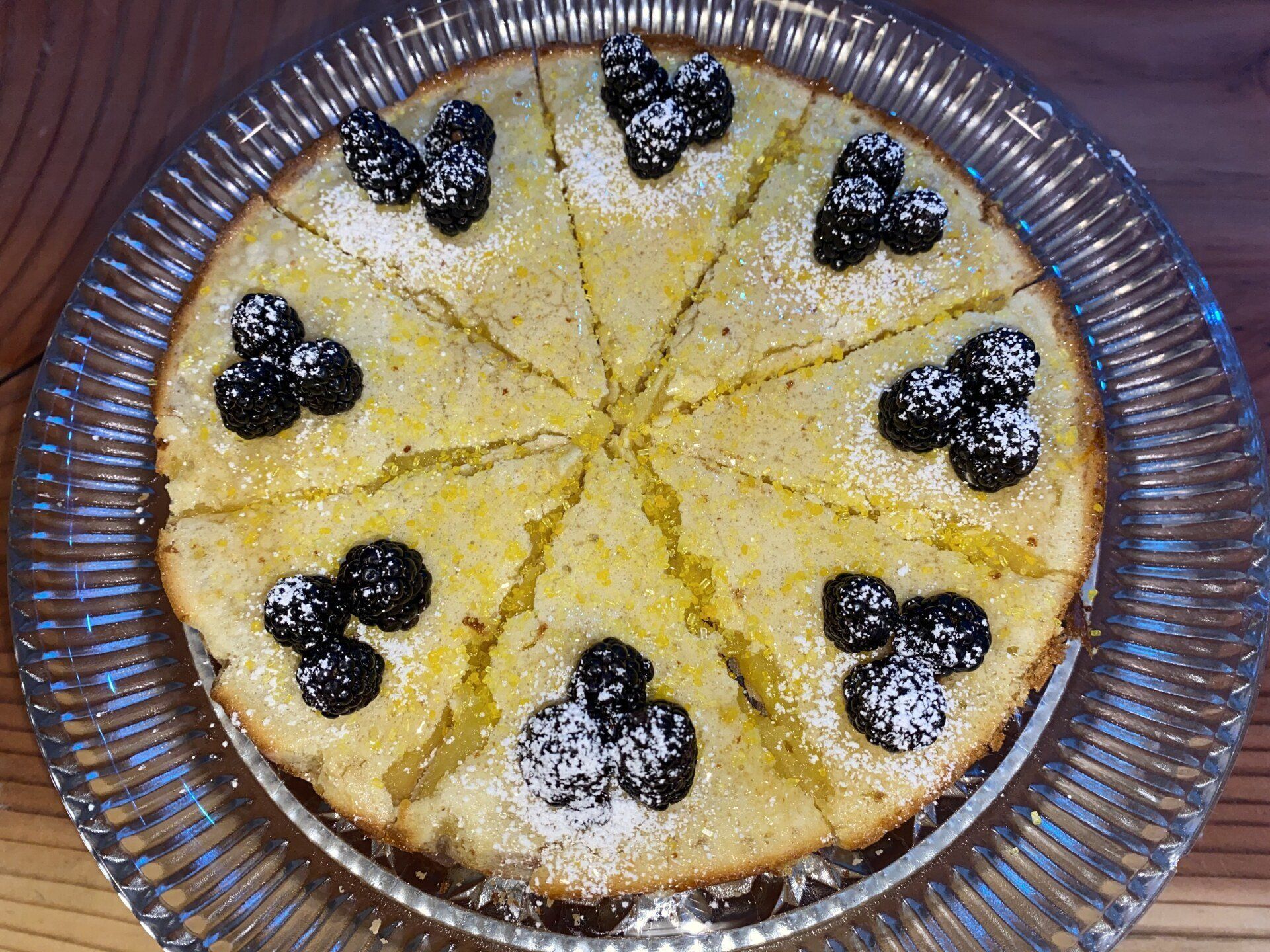 Bell In The Woods 3 course gourmet breakfast. Lemon cake tops with blackberries and powered sugar.
