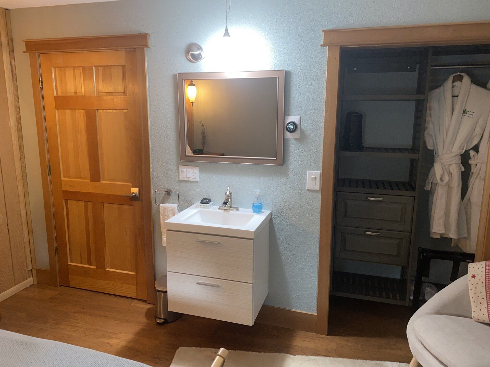 Mt. Adair deluxe double room in Bell In The Woods B&B in Alaska. Vanity and a mirror.